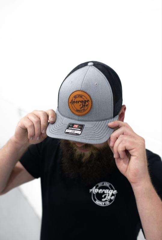 LEATHER PATCH TRUCKER HAT