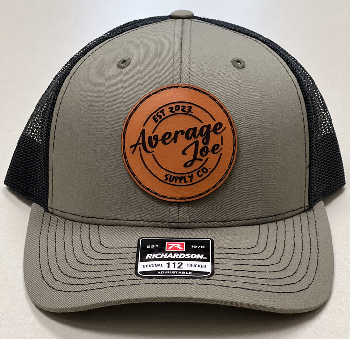 LEATHER PATCH TRUCKER HAT